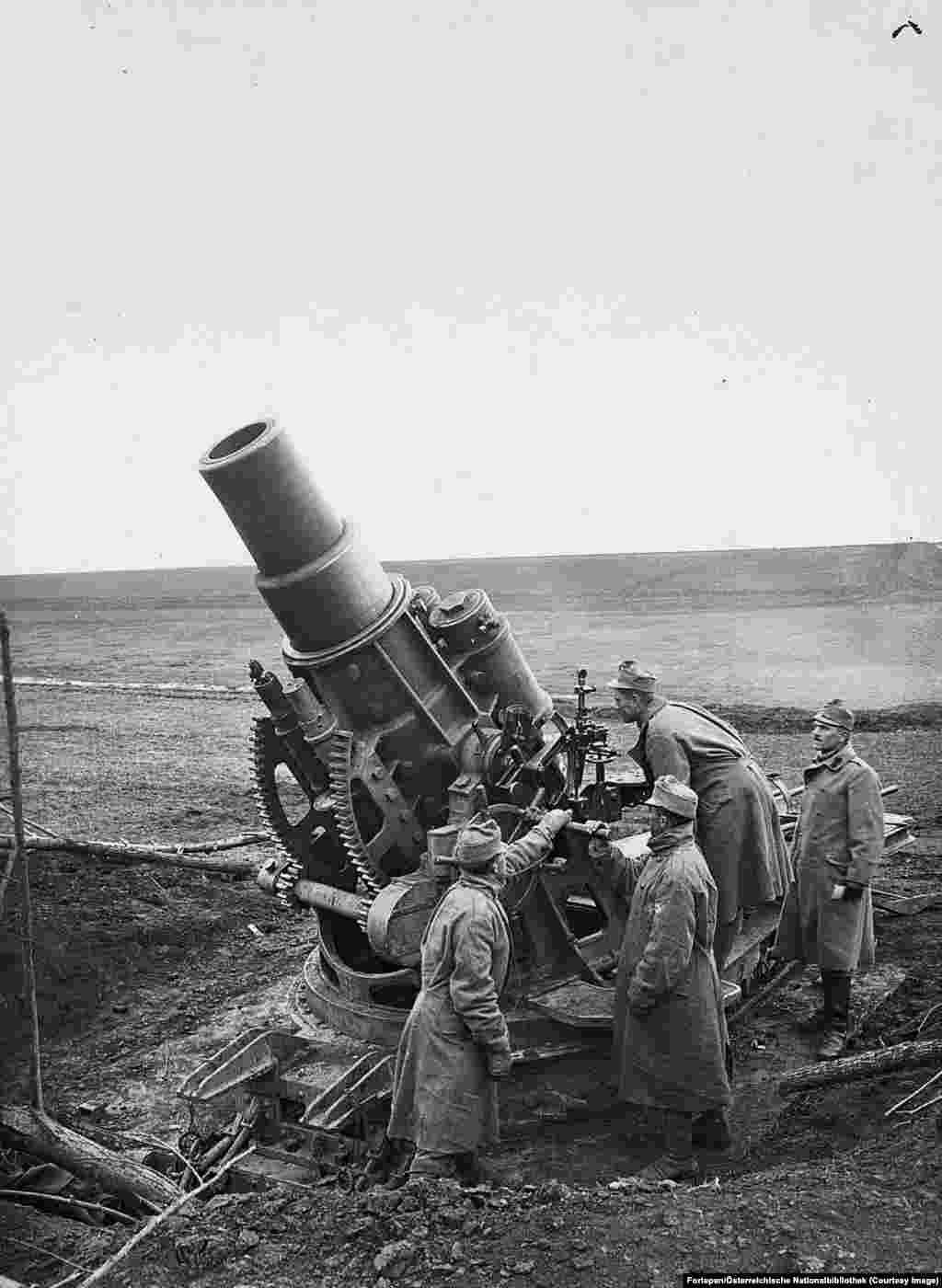 A Skoda &quot;siege mortar&quot; being operated by Austro-Hungarian forces somewhere in today&#39;s Ukraine in 1915. The mortar lobbed shells weighing 384 kilograms each and was later put to use by the Nazis in World War II.&nbsp;