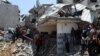 Urmările unui atac israelian asupra unei case, în Jabalia, Gaza. 23 mai 2025. 