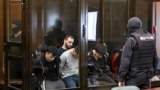 A group of defendants accused of involvement in the 2024 Crocus City Hall music venue gun attack that killed 149 people, goes on trial in Moscow on August 4, 2025. (Photo by Alexander NEMENOV / AFP)