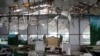 The damaged wedding hall where a suicide bomber struck on August 17, killing dozens of people.