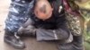 Скриншот видео о предполагаемом насилии над заключенными в казахстанской колонии.