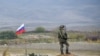 A Russian peacekeeper patrols at the check point outside Askeran in Nagorno-Karabakh (file photo).
