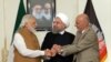 له ښي خوا: افغان ولسمشر اشرف غني، ایرانی ولسمشر حسن روحاني او هندی وزیراعظم نرېندرا مودي د چابهار تړون تر لاسلیکولو وروسته