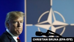 Donald Trump speaks during a press conference on the second day of the NATO Summit in Brussels, Belgium, 12 July 2018